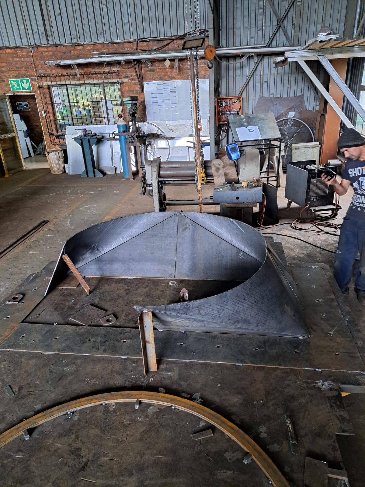 Square-to-round chute being assembled